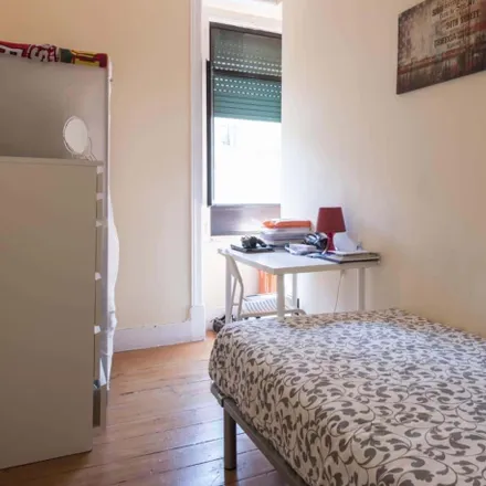 Rent this 5 bed room on Rua António Pereira Carrilho in 1000-047 Lisbon, Portugal