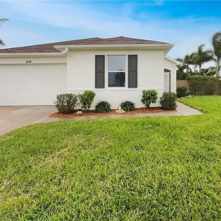 Buy this 3 bed house on 409 Nw 20th Pl in Cape Coral, Florida