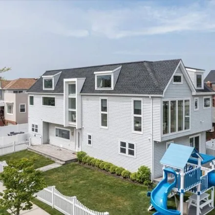Buy this 6 bed house on 571 East Olive Street in City of Long Beach, NY 11561