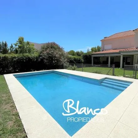 Rent this 3 bed house on unnamed road in Partido de Tigre, Benavídez