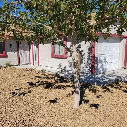 Buy this 2 bed townhouse on 1080 East Calvada Boulevard in Pahrump, NV 89048