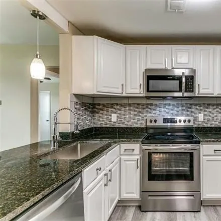 Buy this 2 bed condo on Trinity Meadows Apartments Road in Carrollton, TX 75007