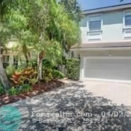 Rent this 4 bed house on 1127 Papaya Street in Hollywood, FL 33019