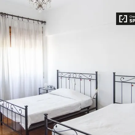 Rent this 4 bed room on Mirandola/Grotta Perfetta in Viale Pico della Mirandola, 00142 Rome RM