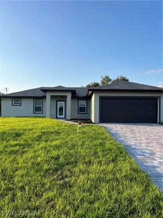 Rent this 3 bed house on 810 Milwaukee Boulevard in Lehigh Acres, FL 33974
