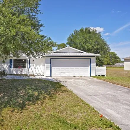 Buy this 4 bed house on 1229 Waterway Street Southwest in Palm Bay, FL 32908