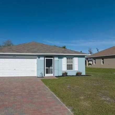 Buy this 3 bed house on Northeast 10th Place in Cape Coral, FL