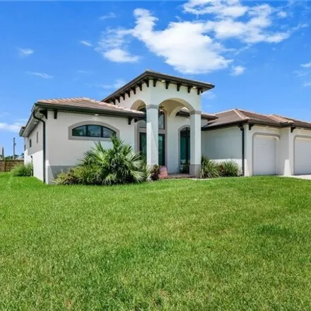 Buy this 3 bed house on 854 Palmetto Pointe Cir in Cape Coral, Florida