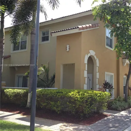 Rent this 3 bed townhouse on 3415 Merrick Court in Margate, FL 33063
