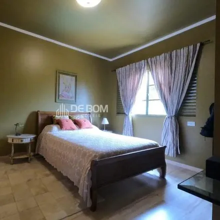 Buy this 4 bed house on unnamed road in Região Urbana Homogênea III, Poços de Caldas - MG