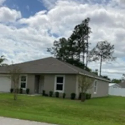 Buy this 4 bed house on 88 Pineapple Drive in Palm Coast, FL 32164