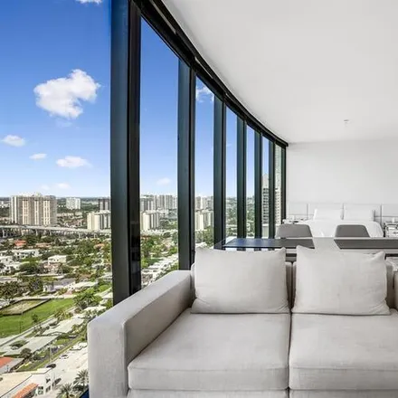 Rent this 3 bed apartment on 18555 Collins Ave