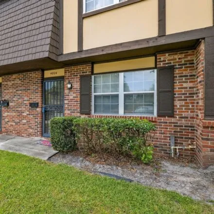 Buy this 2 bed townhouse on 4804 Windrush Lane in Jacksonville, FL 32217