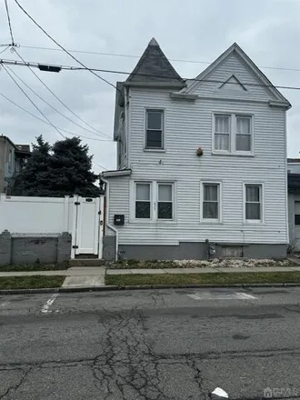 Rent this 3 bed house on 433 Johnstone Street in Perth Amboy, NJ 08861