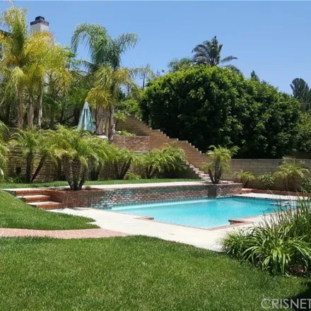 Rent this 4 bed house on 18535 Brasilia Drive in Los Angeles, CA 91326