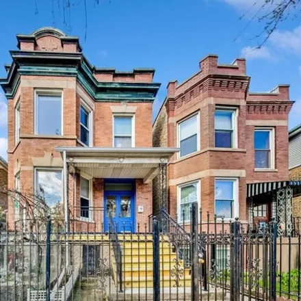 Buy this 8 bed house on 2422 North Central Park Avenue in Chicago, IL 60647