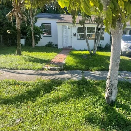 Buy this 2 bed house on 1778 Northwest 56th Street in Liberty Square, Miami