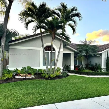 Rent this 4 bed house on 1945 Lakeshore Drive in Weston, FL 33326