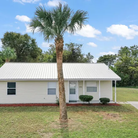 Buy this 3 bed house on 1800 Fairlane Drive in Whispering Hills Golf Estates, Titusville