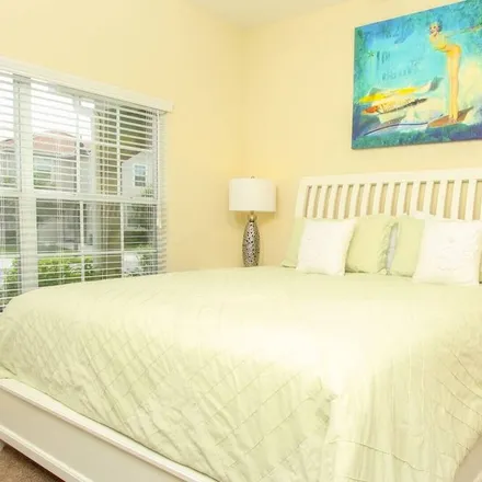 Rent this 4 bed townhouse on Estefan Kitchen Orlando in Sunset Walk at Margaritaville Resort Orlando, 3269 Margaritaville Boulevard