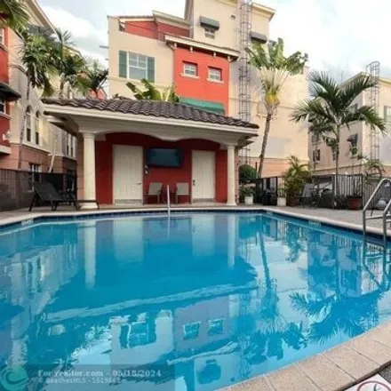 Buy this 3 bed townhouse on 1072 Northeast 17th Avenue in Fort Lauderdale, FL 33304