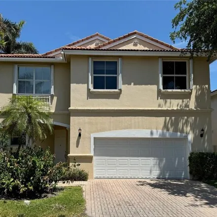 Buy this 4 bed house on 1097 Scarlet Oak Street in Hollywood, FL 33019