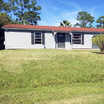 Buy this 2 bed house on 135 Southwest Starfish Avenue in Port Saint Lucie, FL 34984