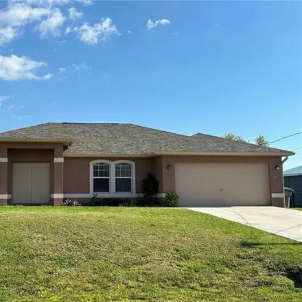 Rent this 4 bed house on 1876 Northwest 23rd Terrace in Cape Coral, FL 33993