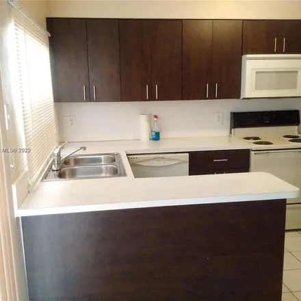 Rent this 2 bed apartment on 4449 Treehouse Lane in Tamarac, FL 33319
