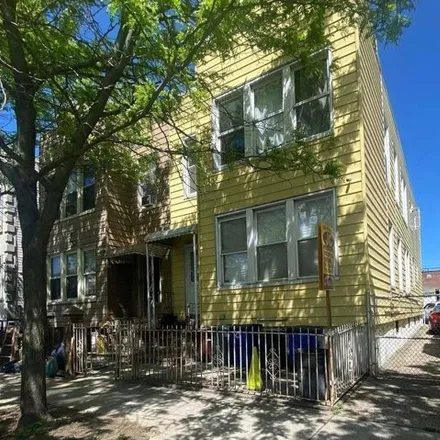 Buy this 6 bed house on 87-61 125th Street in New York, NY 11418