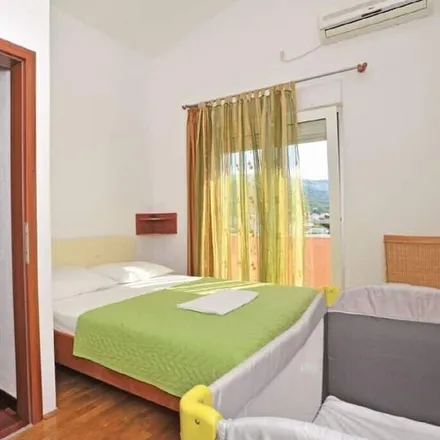 Rent this 8 bed house on 21312 Općina Podstrana