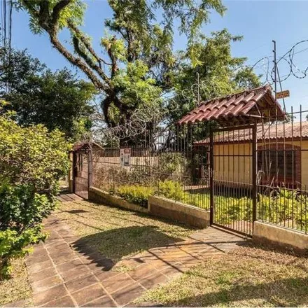 Buy this 3 bed house on Acesso das Orquídeas in Santa Tereza, Porto Alegre - RS