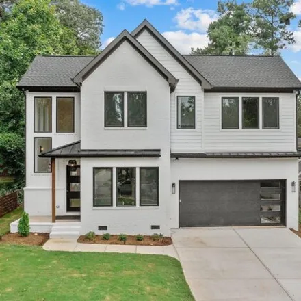 Buy this 5 bed house on 1347 Courtland Drive in Raleigh, NC 27604