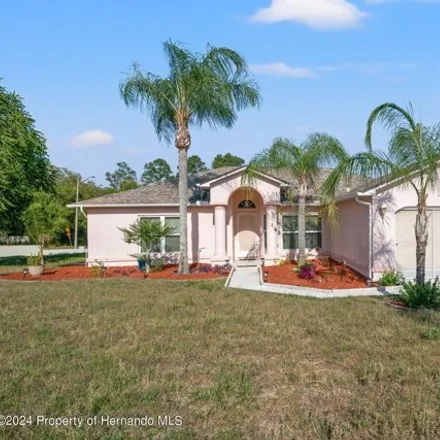 Buy this 4 bed house on 1399 Masada Lane in Spring Hill, FL 34608