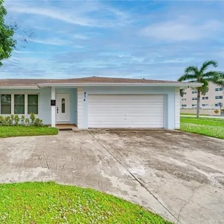 Rent this 4 bed house on 719 Southeast 7th Street in Barwal, Deerfield Beach