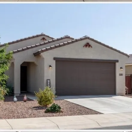 Rent this 3 bed house on 985 E White Wing Dr in Casa Grande, Arizona