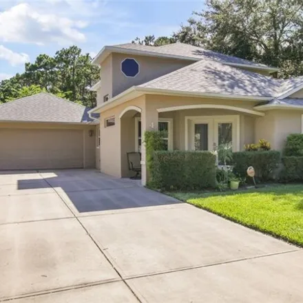 Buy this 5 bed house on 4 Meadowrun Court in Ormond Beach, FL 32174