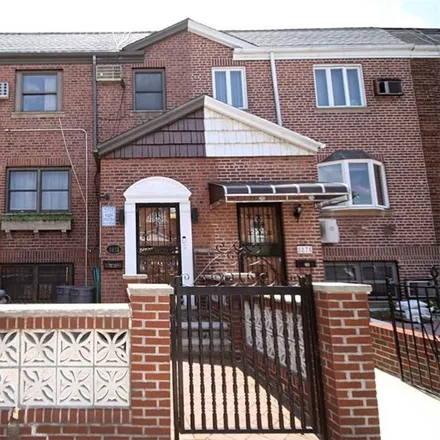 Buy this 4 bed townhouse on 8873 18th Avenue in New York, NY 11214