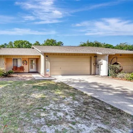 Buy this 3 bed house on 1040 West Village Green Road in DeLand, FL 32720