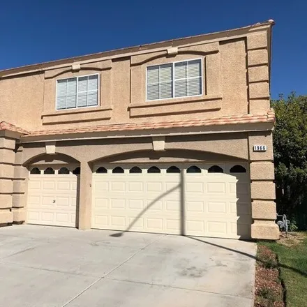 Rent this 5 bed house on 1974 Golden Trumpet Avenue in Paradise, NV 89123