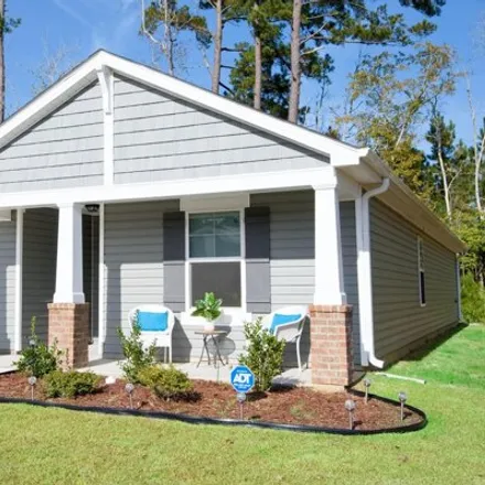 Buy this 4 bed house on Lighthouse Cove Loop in Carolina Shores, Brunswick County