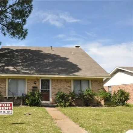 Rent this 4 bed house on 2637 Sam Houston Drive in Garland, TX 75044