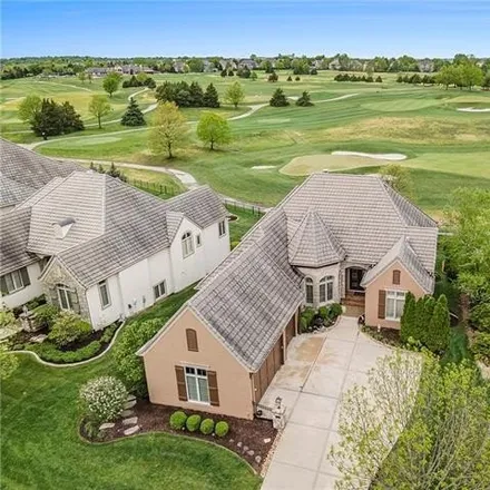 Buy this 4 bed house on 14118 Nicklaus Drive in Overland Park, KS 66223