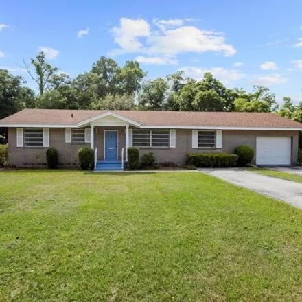 Rent this 4 bed house on 420 North Fairview Avenue in DeLand, FL 32724