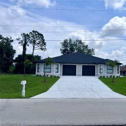 Rent this 3 bed house on 30th Street in Lehigh Acres, FL 33973