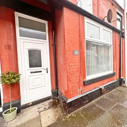 Rent this 3 bed townhouse on Park Road in Widnes, WA8 6HG