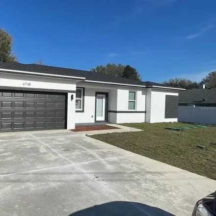 Rent this 4 bed house on 6754 Cherry Road in Marion County, FL 34472