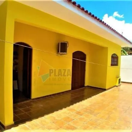 Buy this 4 bed house on Rua das Orquídeas in Flórida, Praia Grande - SP