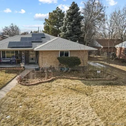 Buy this 4 bed house on 3256 Monaco Parkway in Denver, CO 80207