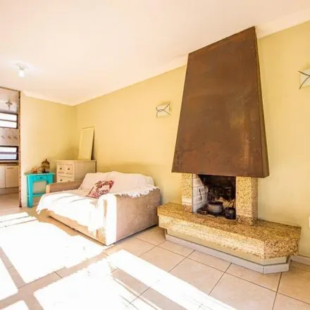 Buy this 3 bed house on Rua Estácio Pessoa in Cristo Redentor, Porto Alegre - RS